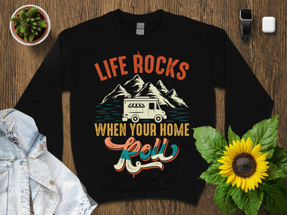Black sweatshirt with "Life Rocks When Your Home Roll" and RV camper graphic.