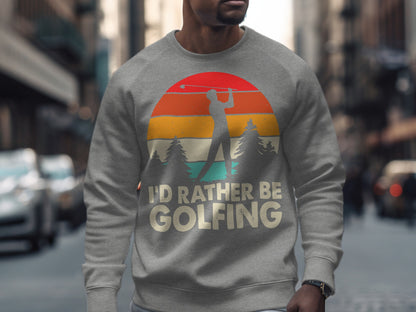 Gray sweatshirt with vintage sunset graphic and "I'd rather be golfing" text.