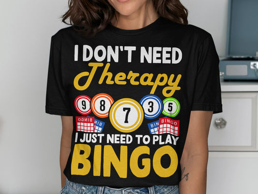 Black t-shirt with "I DON'T NEED Therapy I JUST NEED TO PLAY BINGO" text and bingo balls.