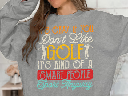 Gray sweatshirt with text: "It's Okay if You Don't Like GOLF. It's Kind of a Smart People Sport Anyway."