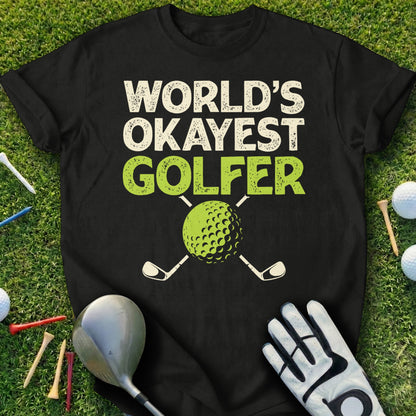 Black t-shirt with "WORLD'S OKAYEST GOLFER" text and golf ball graphic.