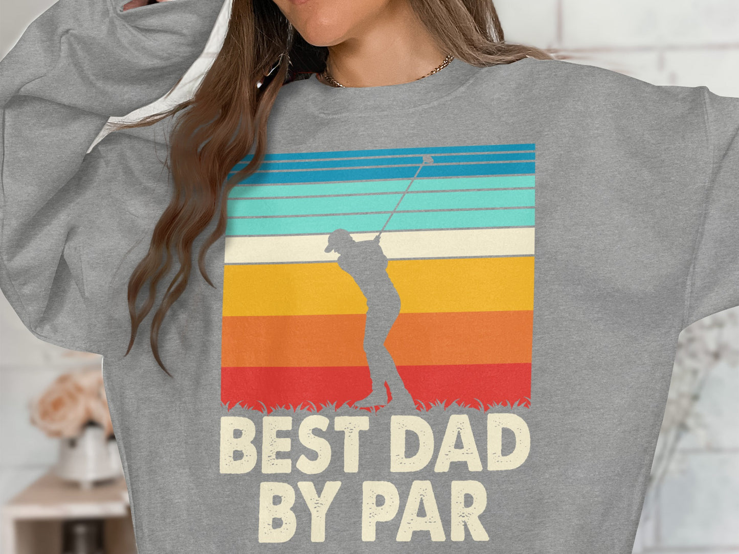 Gray sweatshirt with vintage golf graphic and text "BEST DAD BY PAR".
