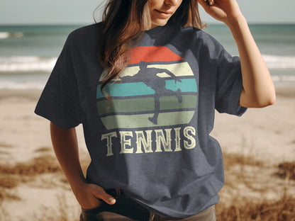 Dark blue t-shirt with vintage tennis player graphic and text.