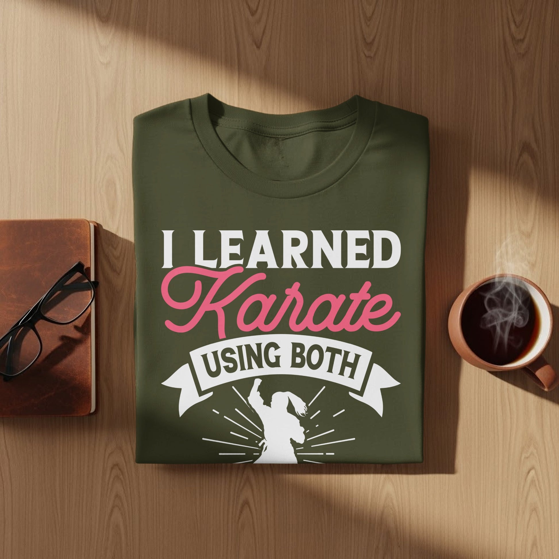 Olive green t-shirt with "I Learned Karate Using Both" text and graphic.