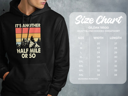 Hoodie with "It's Another Half Mile Or So" text and mountain graphic, with size chart.