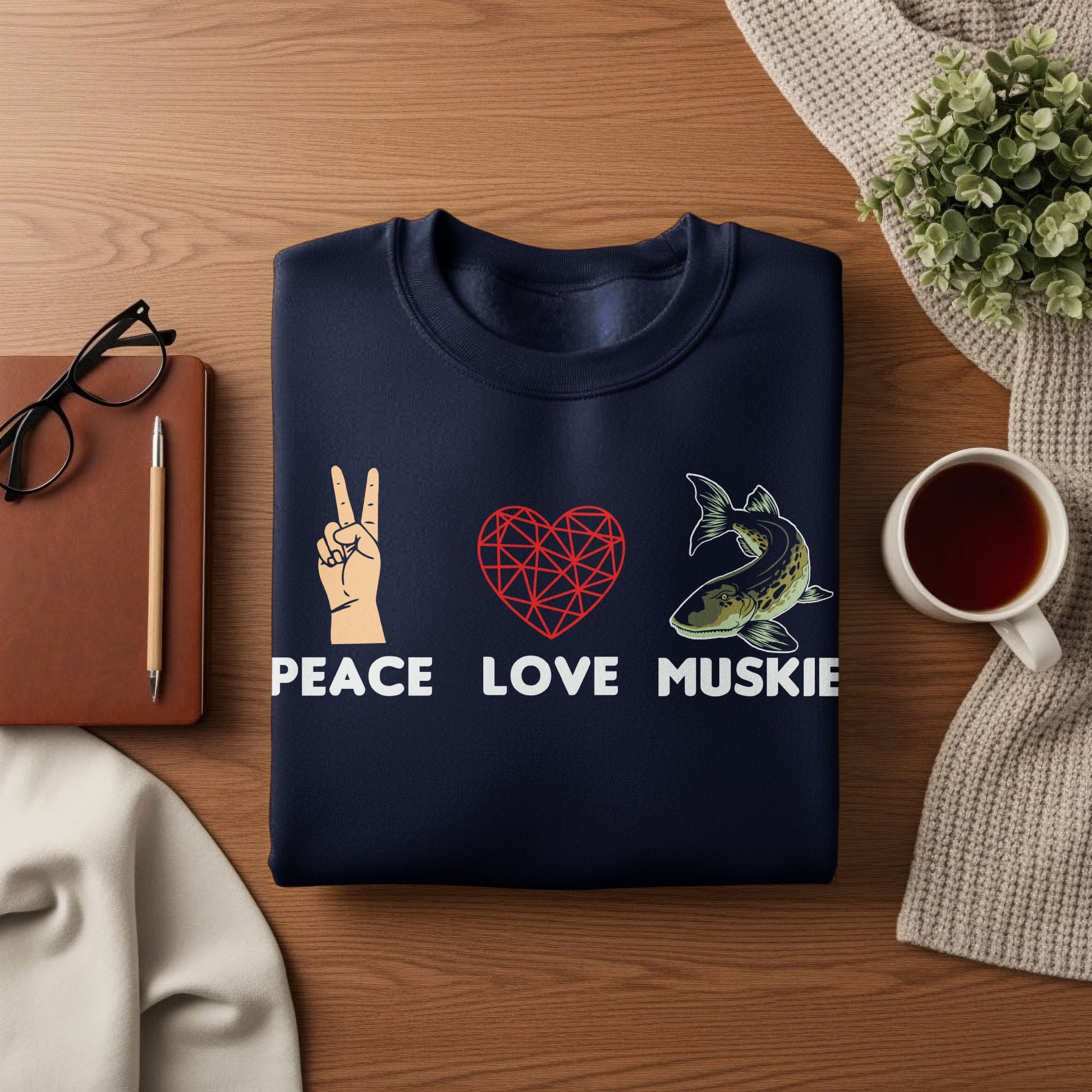 Navy sweatshirt with peace sign, heart, and muskie graphic, text reads "Peace Love Muskie".