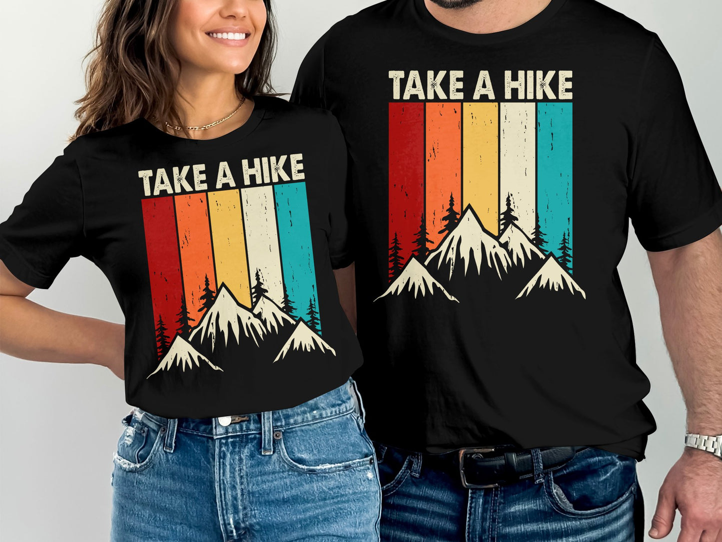 Two black t-shirts with "TAKE A HIKE" and mountain graphic.