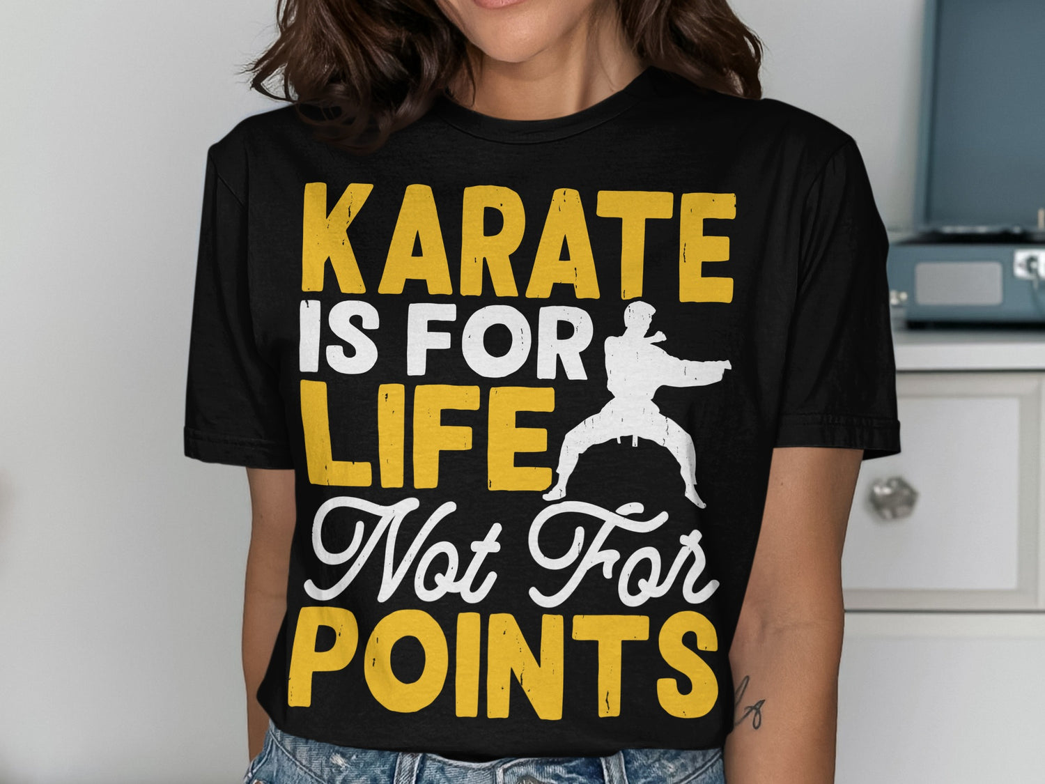 Black t-shirt with "Karate Is For Life Not For Points" and a martial artist silhouette.