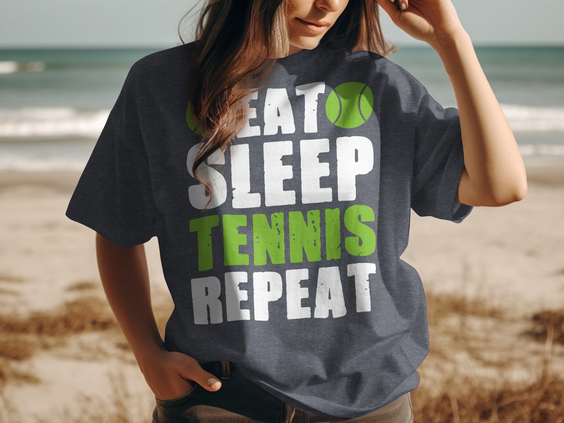 Dark t-shirt with "Eat Sleep Tennis Repeat" text and tennis ball graphic.