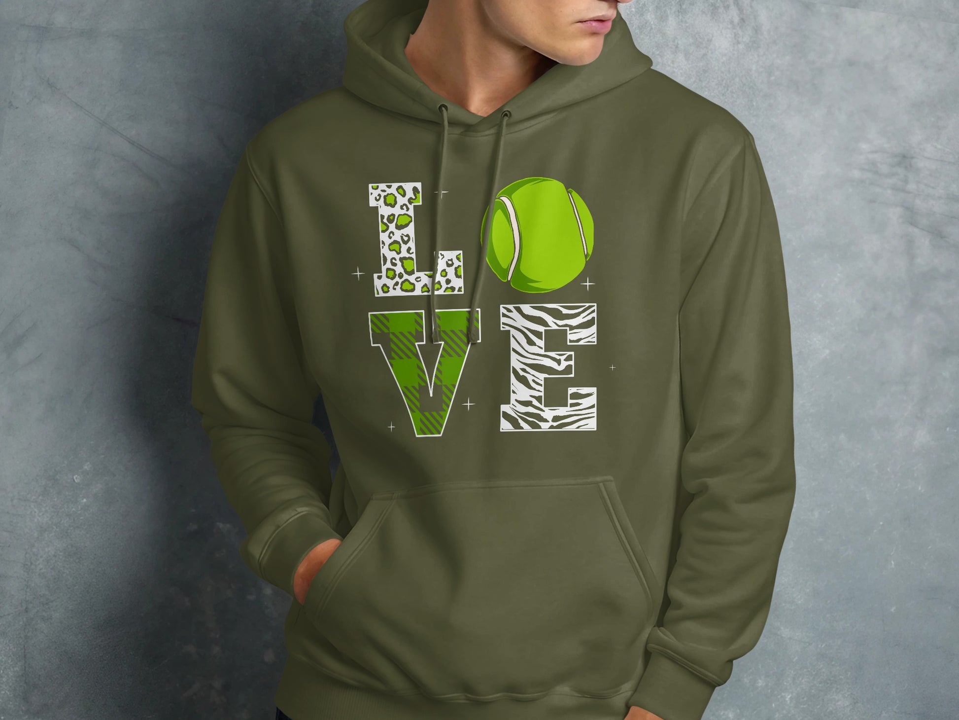 Green hoodie with "LOVE" design featuring tennis ball and animal prints.