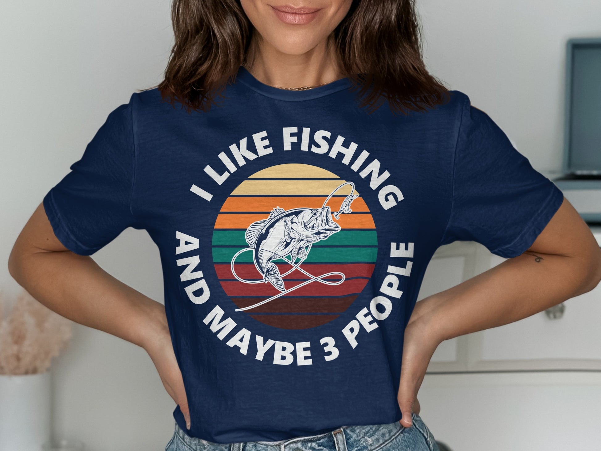 Navy t-shirt with "I LIKE FISHING AND MAYBE 3 PEOPLE" and a fish graphic.