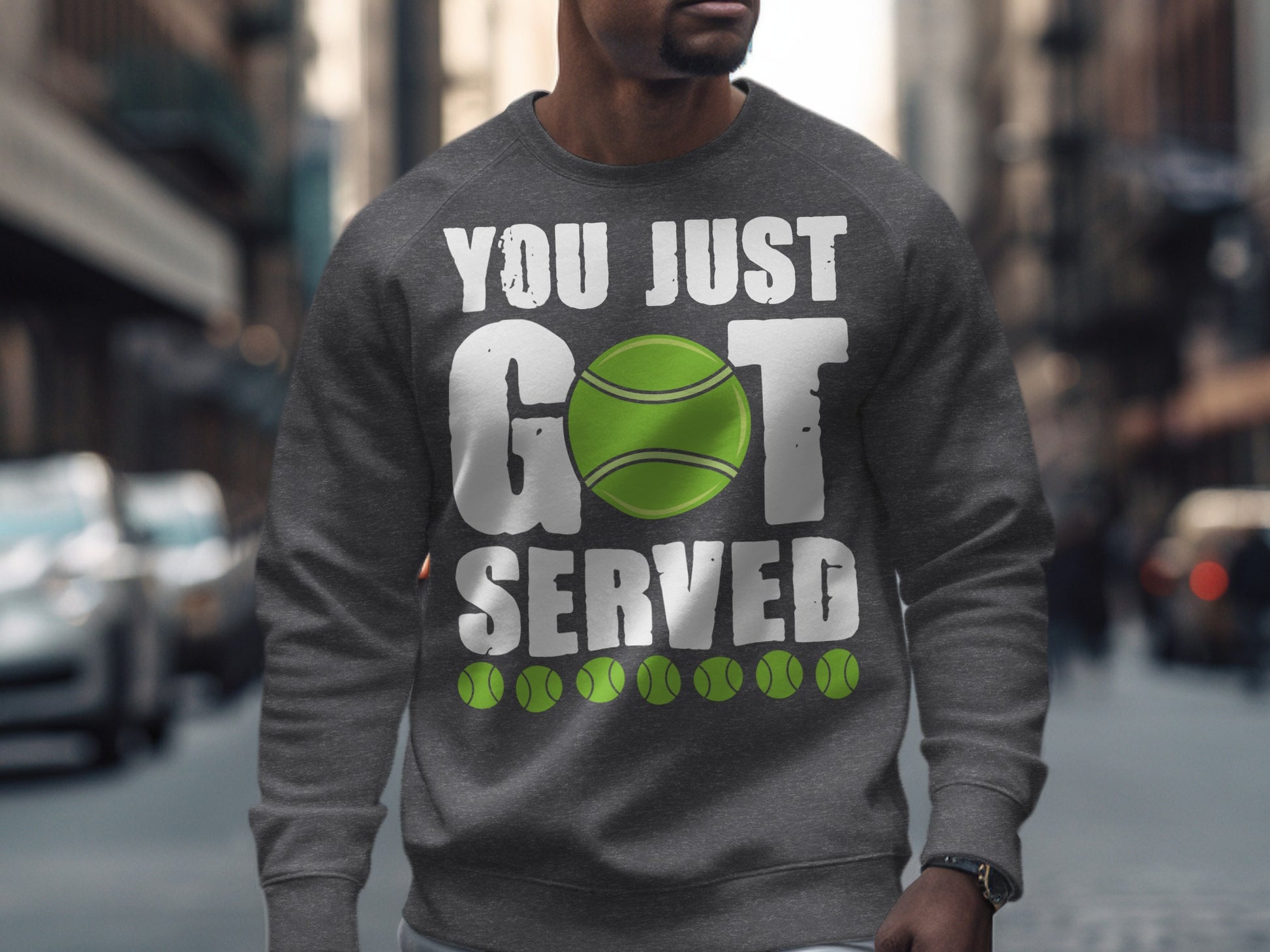 Gray sweatshirt with "YOU JUST SERVED" and tennis ball graphics.