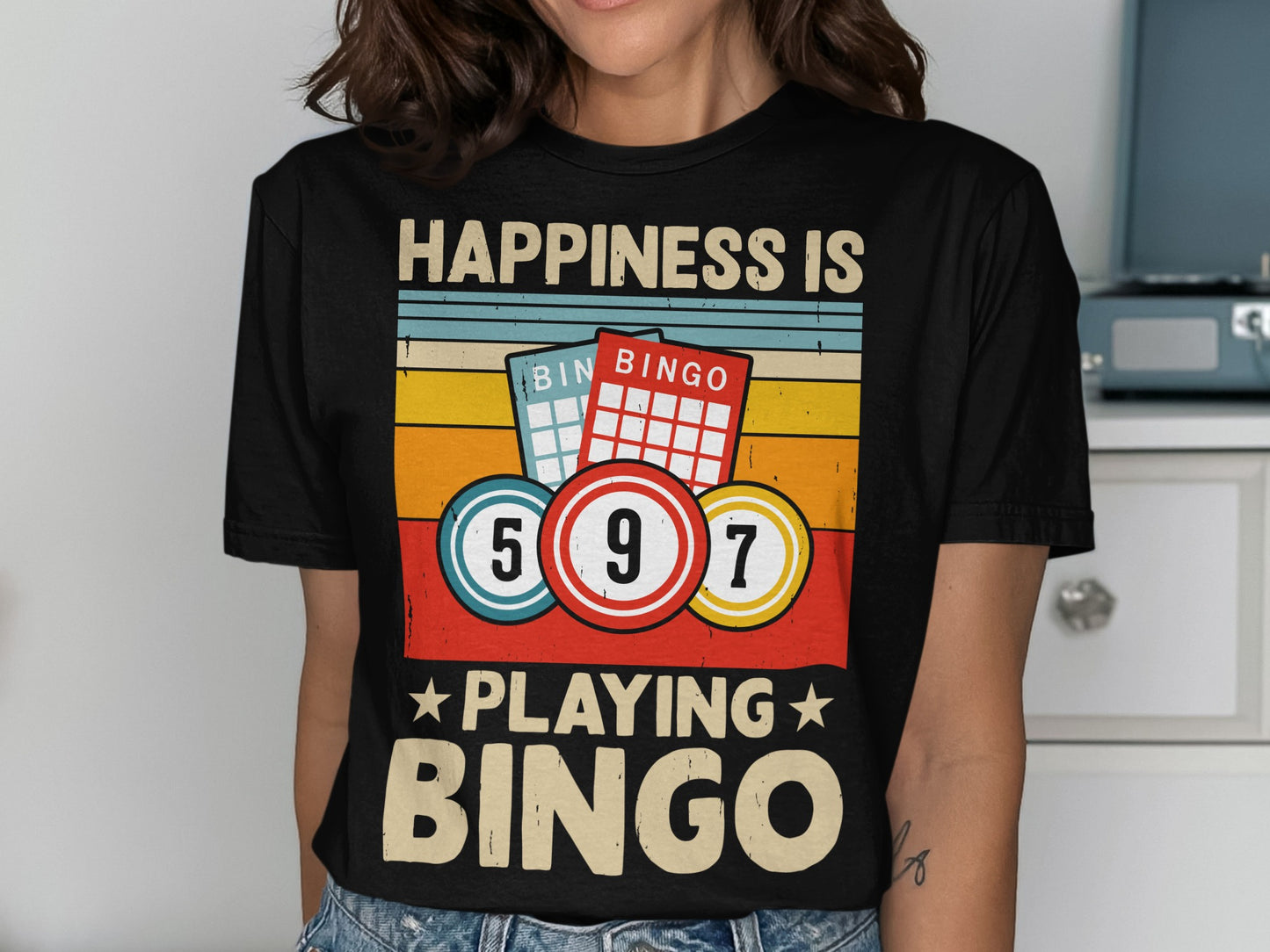 Black t-shirt with "Happiness is playing Bingo" and Bingo balls.