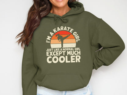 Green hoodie with "I'm a karate girl, just like a normal girl except much cooler" graphic.