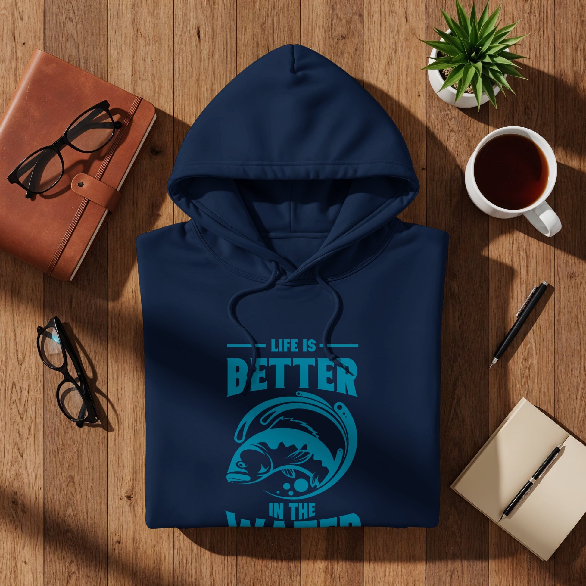 Navy blue hoodie with "Life is Better in the Water" and fish graphic.