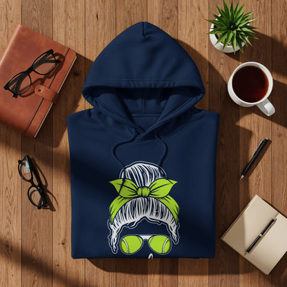 Navy hoodie with graphic of woman with messy bun, sunglasses, and tennis ball.