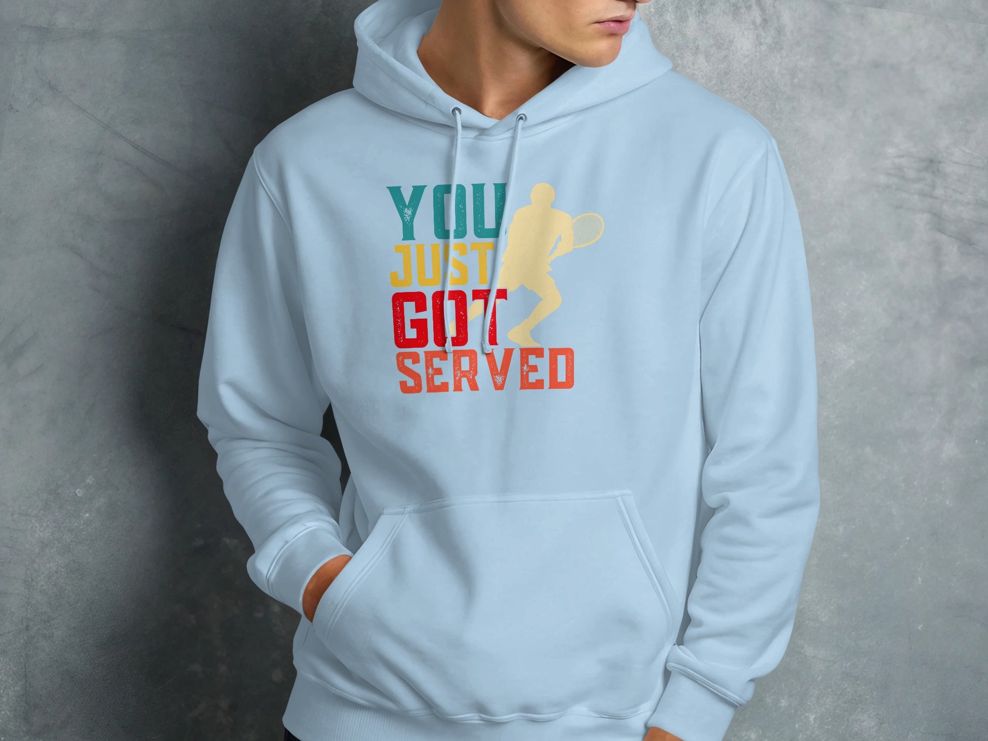 Light blue hoodie with graphic of tennis player and text "YOU JUST GOT SERVED".