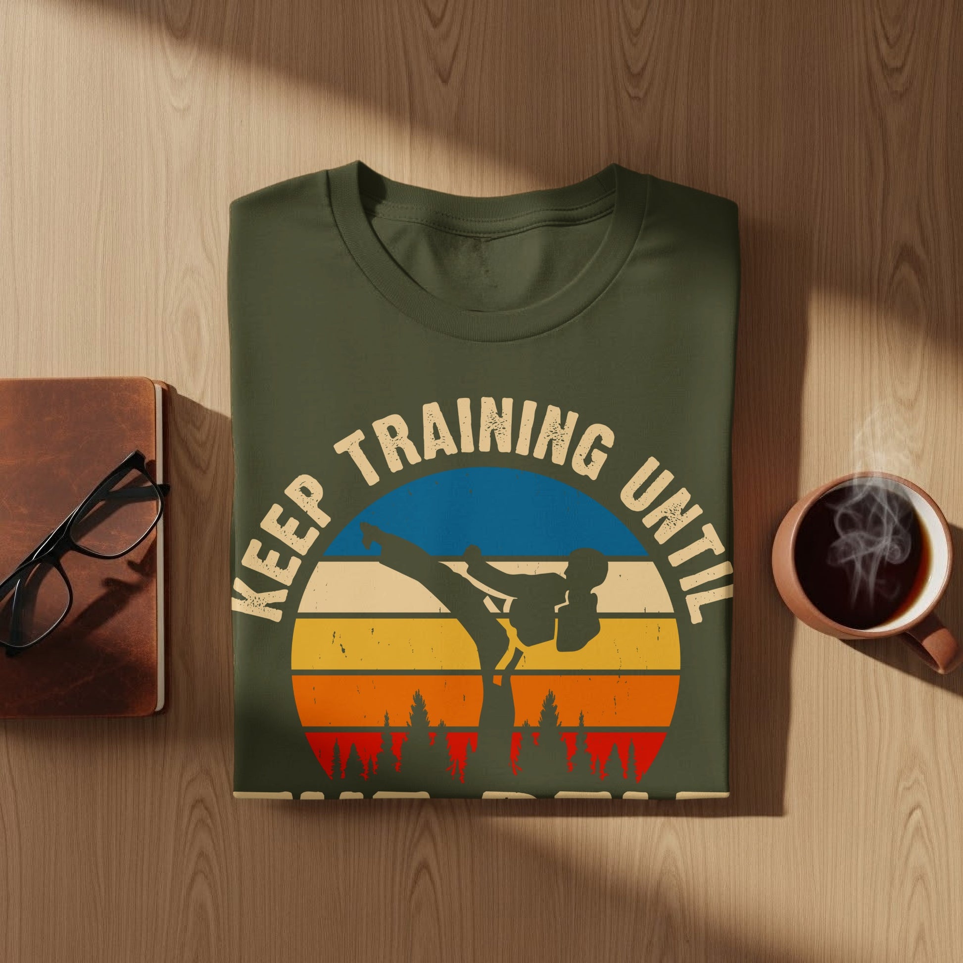 Green t-shirt with "Keep Training Until" text and karate silhouette.