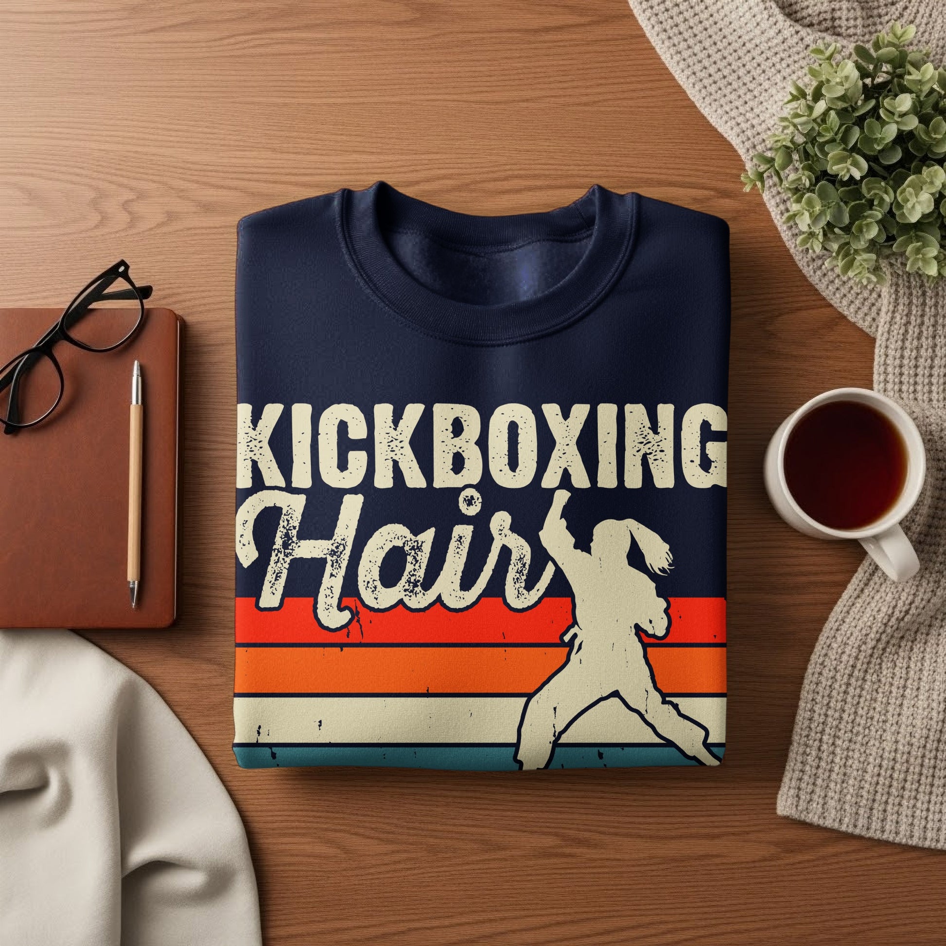 Navy sweatshirt with "Kickboxing Hair" text and silhouette of a fighter.
