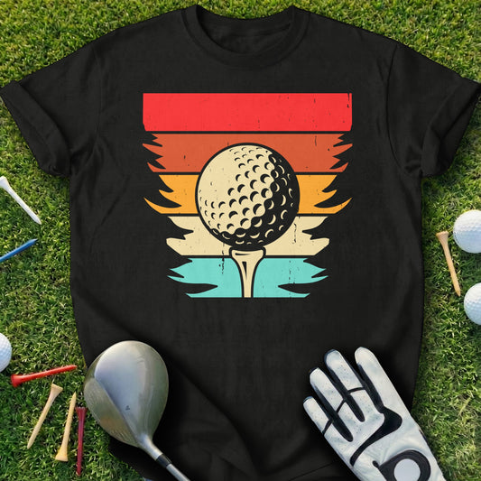 Black t-shirt with vintage sunset golf ball graphic and tees.