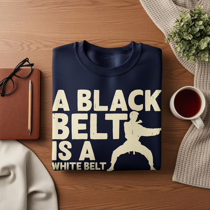Navy sweatshirt with white text "A Black Belt Is A White Belt" and a karate silhouette.