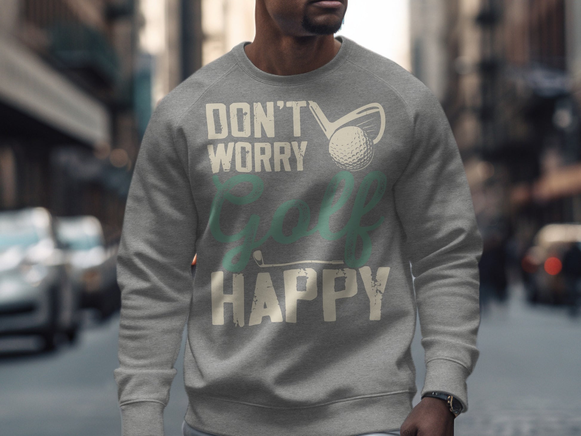 Grey sweatshirt with "Don't Worry Golf Happy" text and golf ball graphic.
