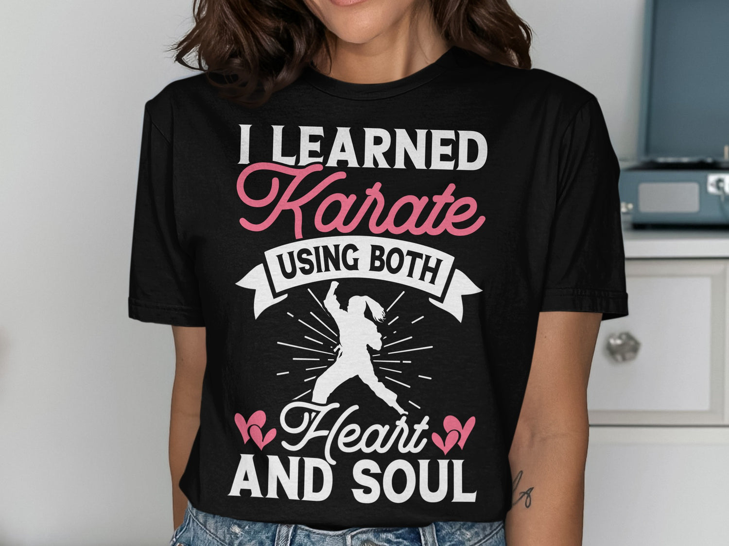 Black t-shirt with "I Learned Karate Using Both Heart and Soul" text.