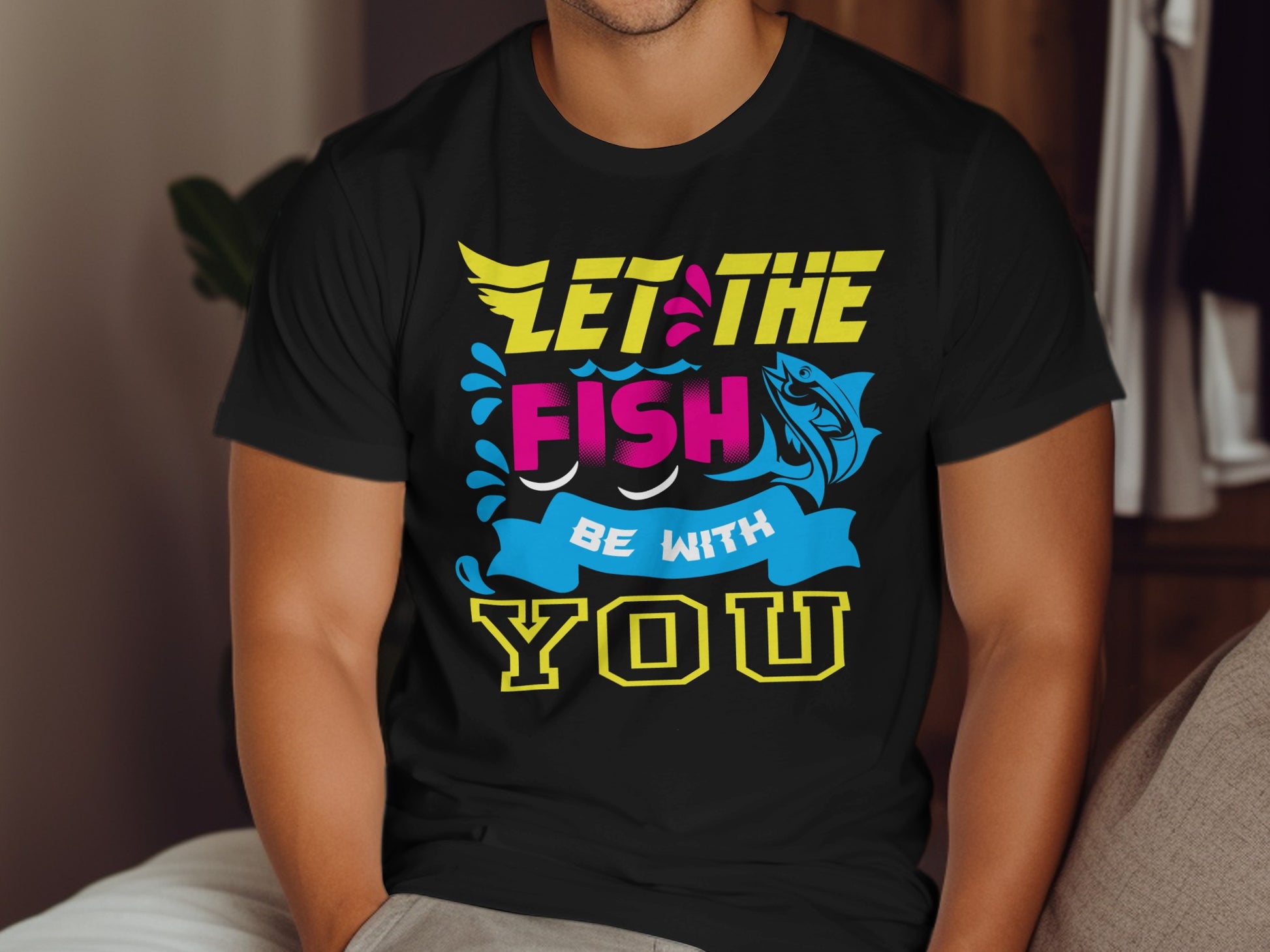 Black t-shirt with "Let the fish be with you" graphic and fish design.