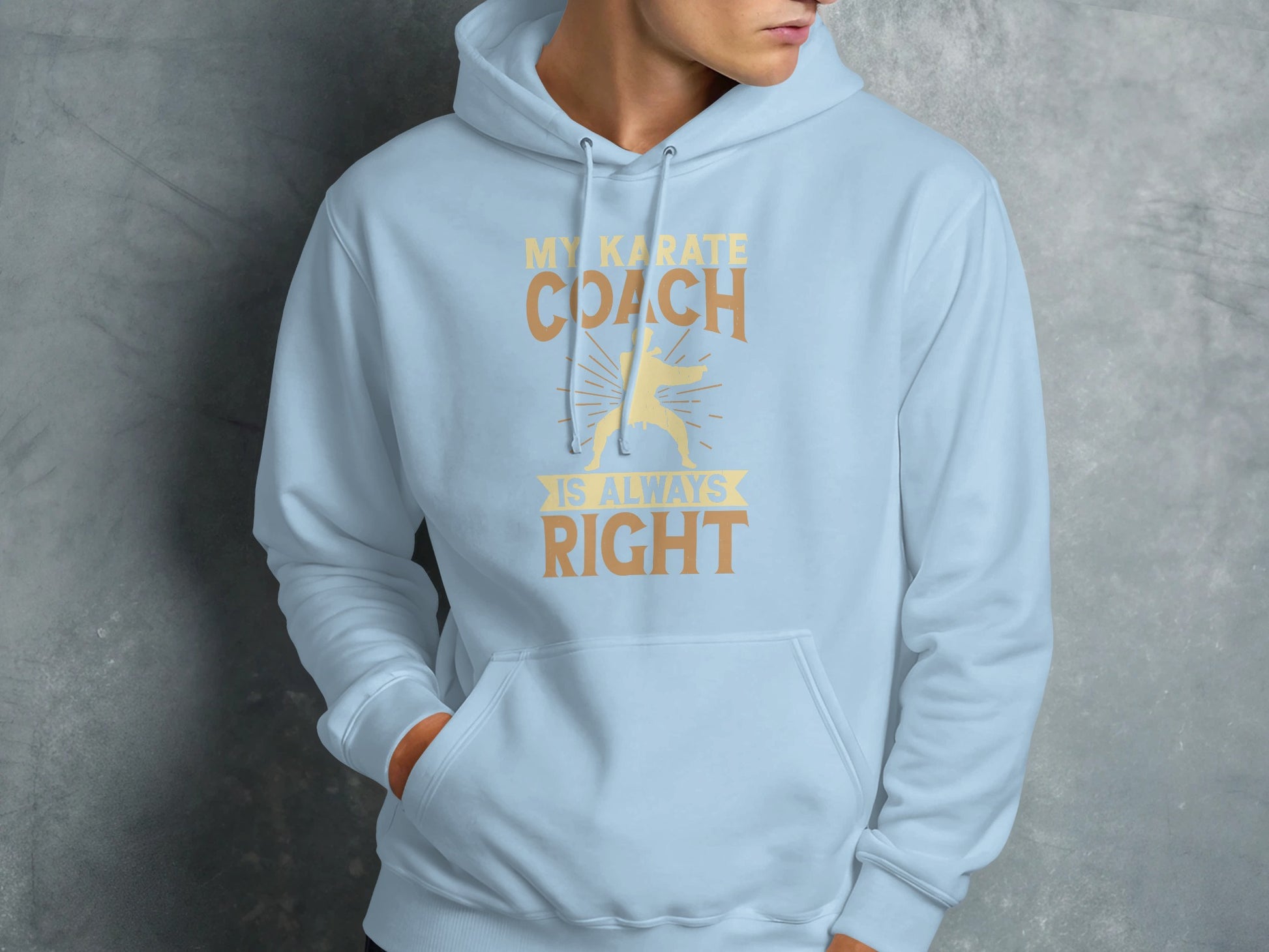Light blue hoodie with text "My Karate Coach is Always Right".