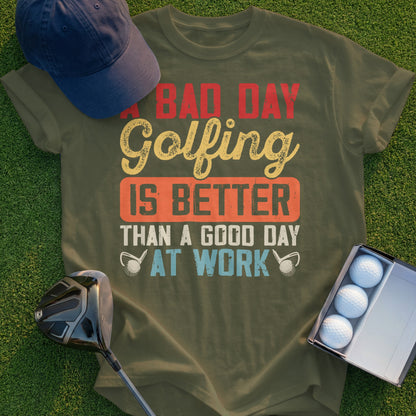 Olive t-shirt with "A Bad Day Golfing Is Better Than A Good Day At Work" text.