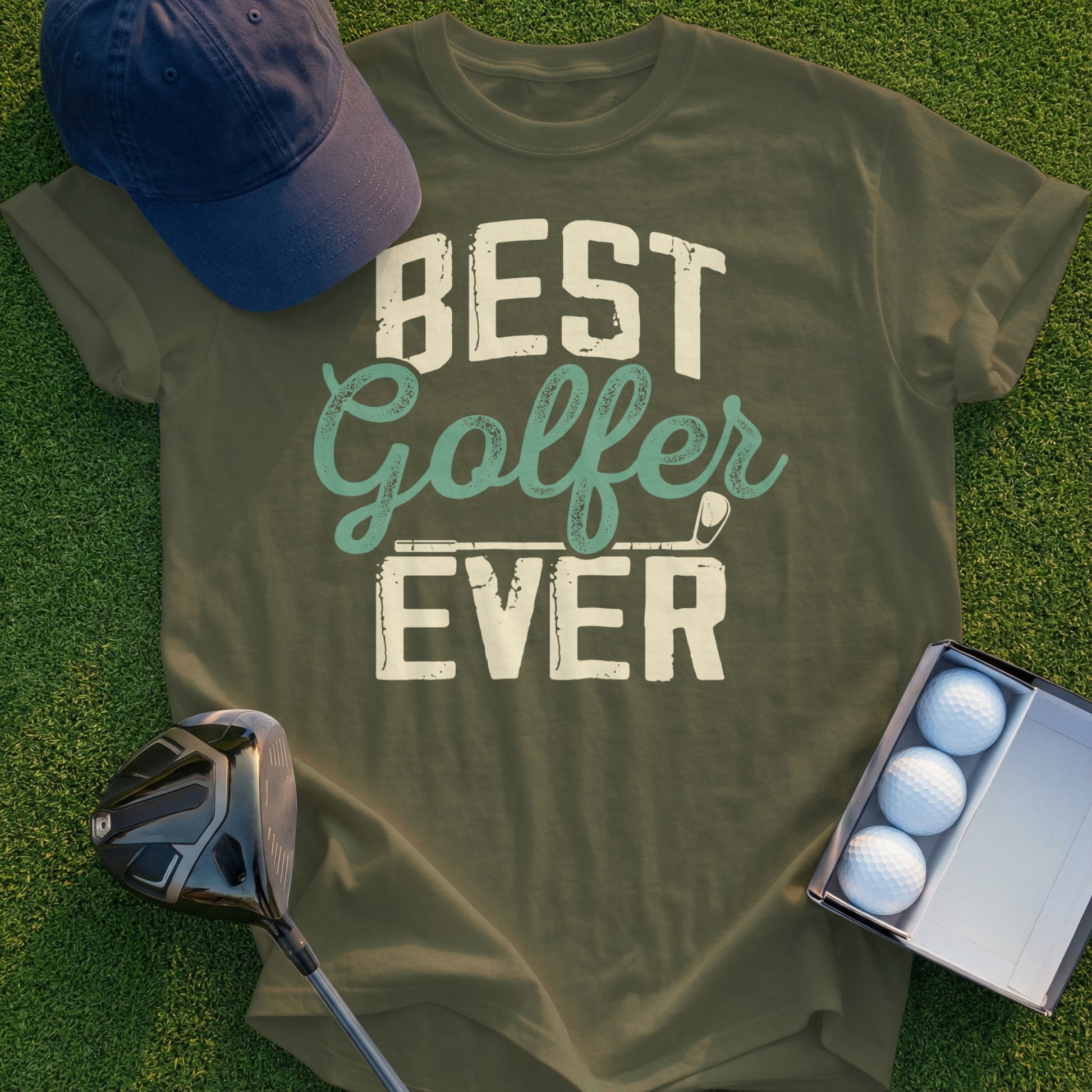 Green t-shirt with "BEST Golfer EVER" text, golf club, and golf balls.