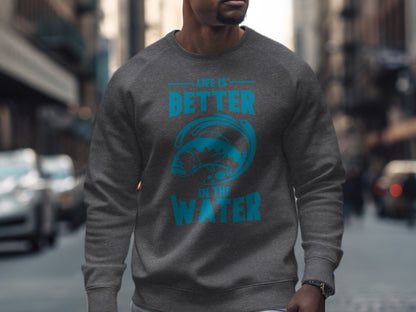 Gray sweatshirt with blue text "LIFE IS BETTER IN THE WATER" and fish graphic.