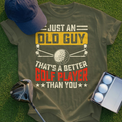 Olive green t-shirt with "Just an Old Guy That's a Better Golfer Than You" text and golf ball.