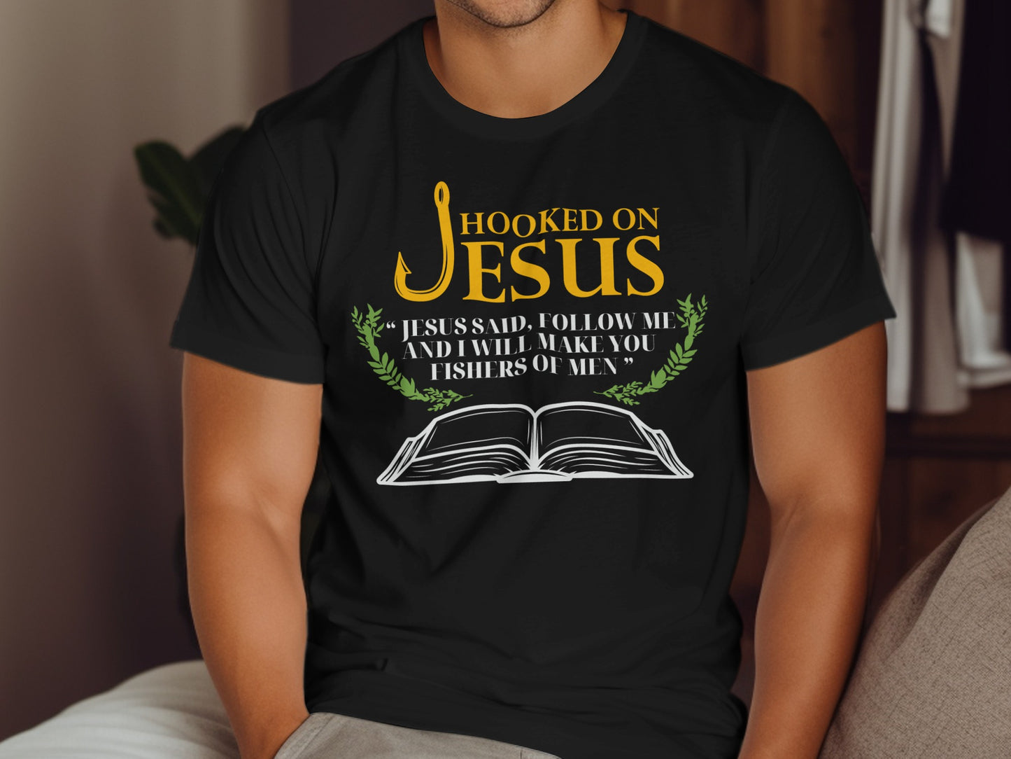 Black t-shirt with "Hooked on Jesus" and Bible verse "Fishers of Men".