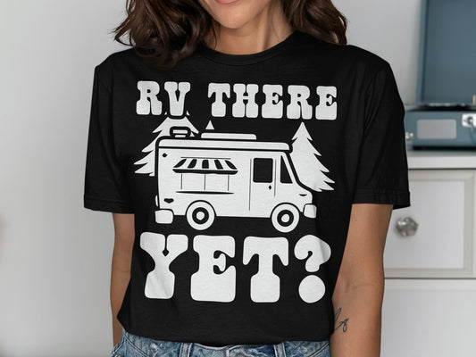 Black t-shirt with white text "RV THERE YET?" and graphic of an RV and trees.