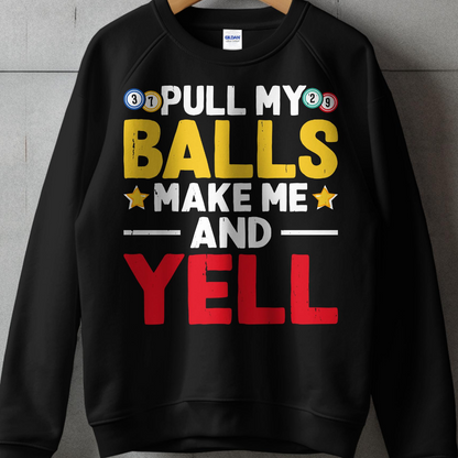 Black sweatshirt with "PULL MY BALLS MAKE ME AND YELL" text in colorful balls.