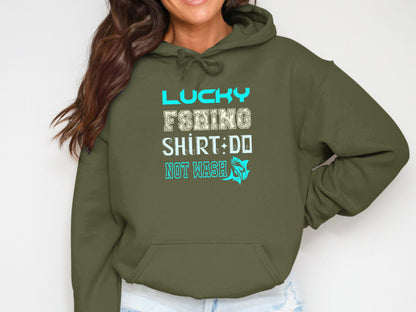 Olive green hoodie with "Lucky Fishing Shirt: Do Not Wash" text and fish graphic.