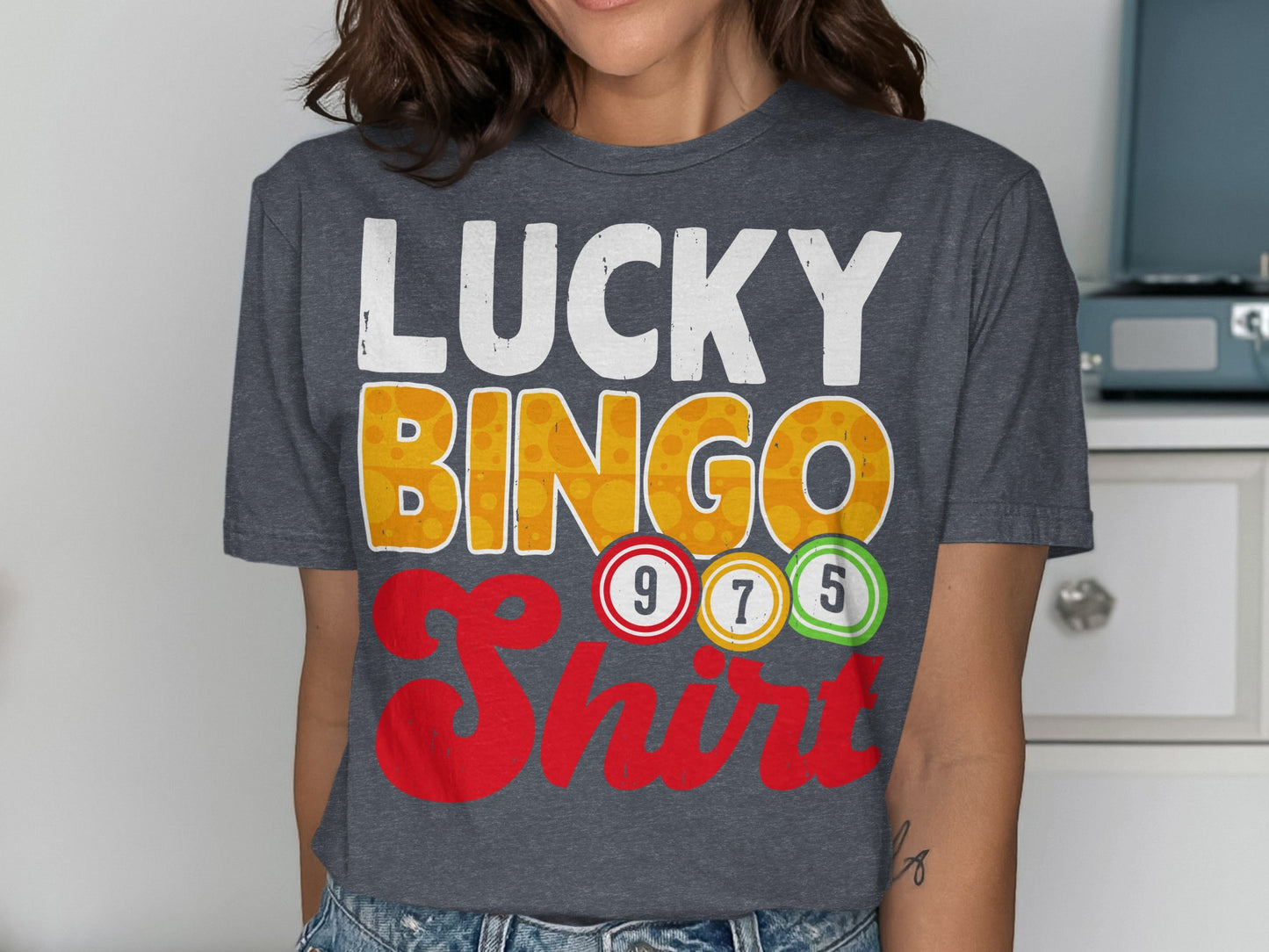 Dark grey t-shirt with "LUCKY BINGO" and colorful bingo balls.