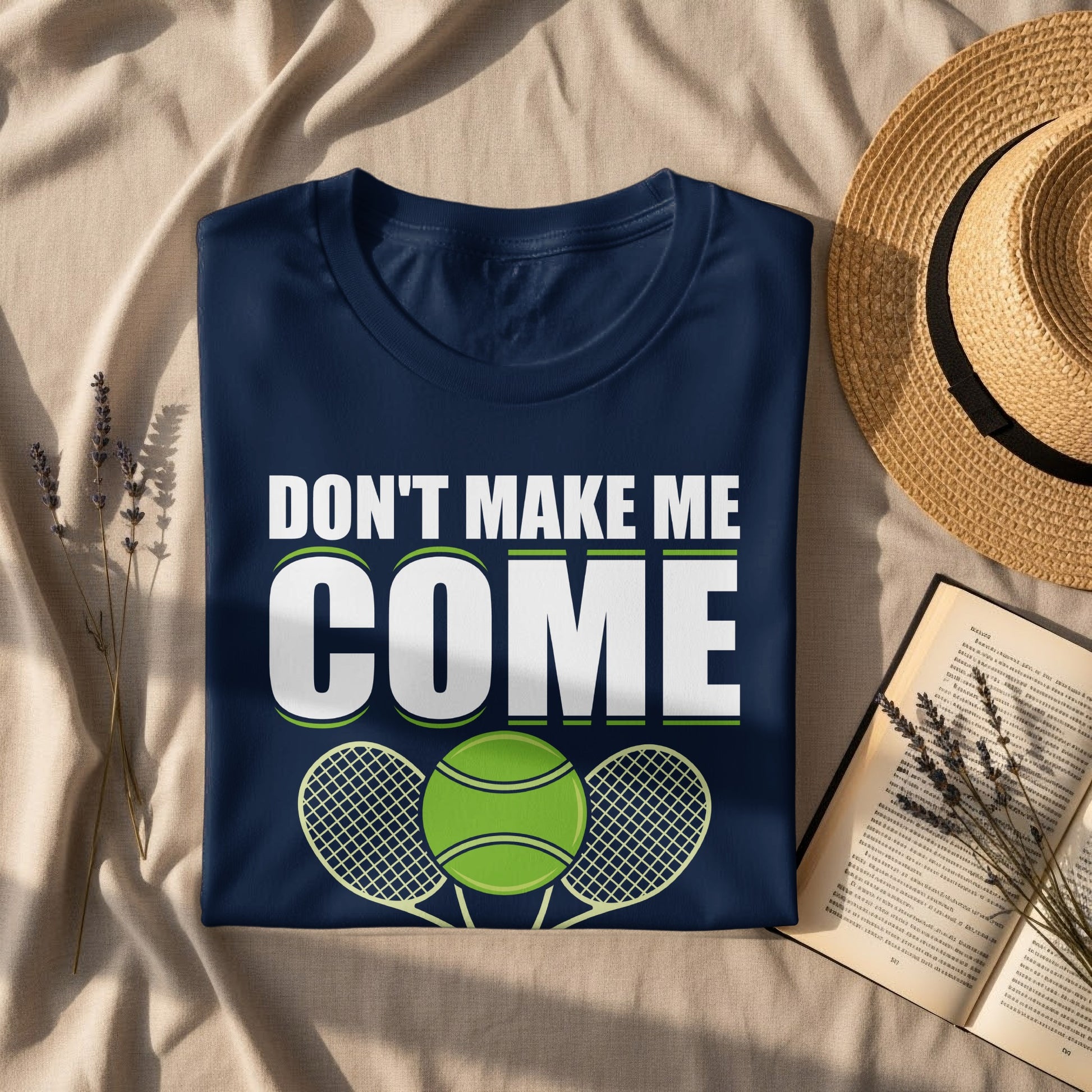 Navy t-shirt with "DON'T MAKE ME COME" text and tennis rackets.