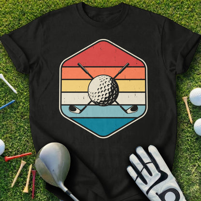 Retro golf ball and crossed clubs logo on a black t-shirt.