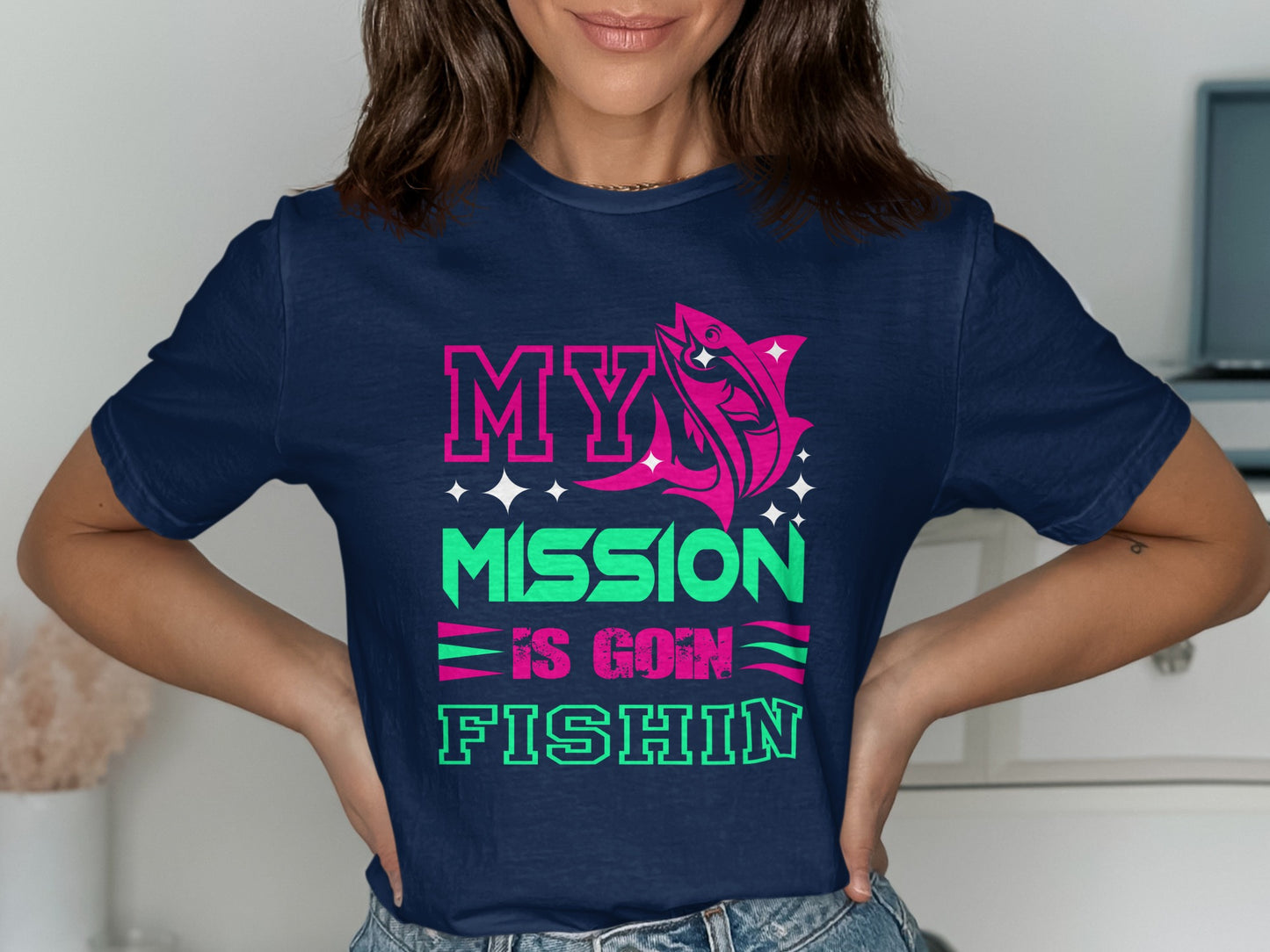 Navy t-shirt with "MY MISSION IS GOIN' FISHIN'" and pink fish graphic.