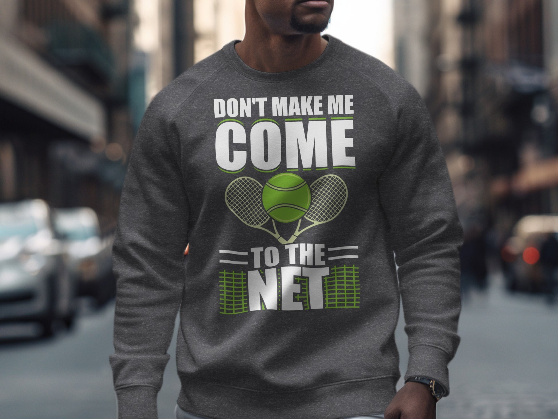 Gray sweatshirt with "Don't Make Me Come To The Net" and tennis graphic.