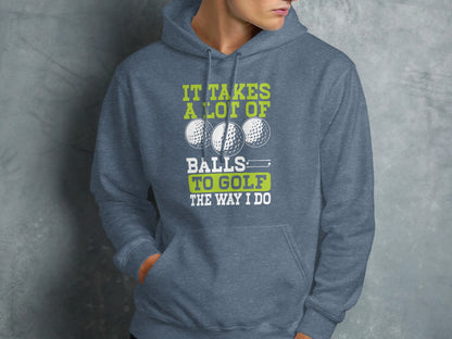 Gray hoodie with "IT TAKES A LOT OF BALLS TO GOLF THE WAY I DO" text and golf balls.