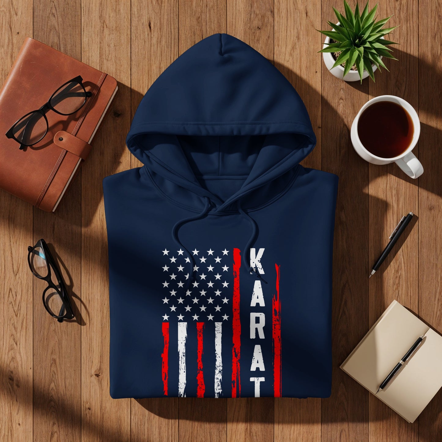 Navy blue hooded sweatshirt with distressed US flag design and "KARAT" text.