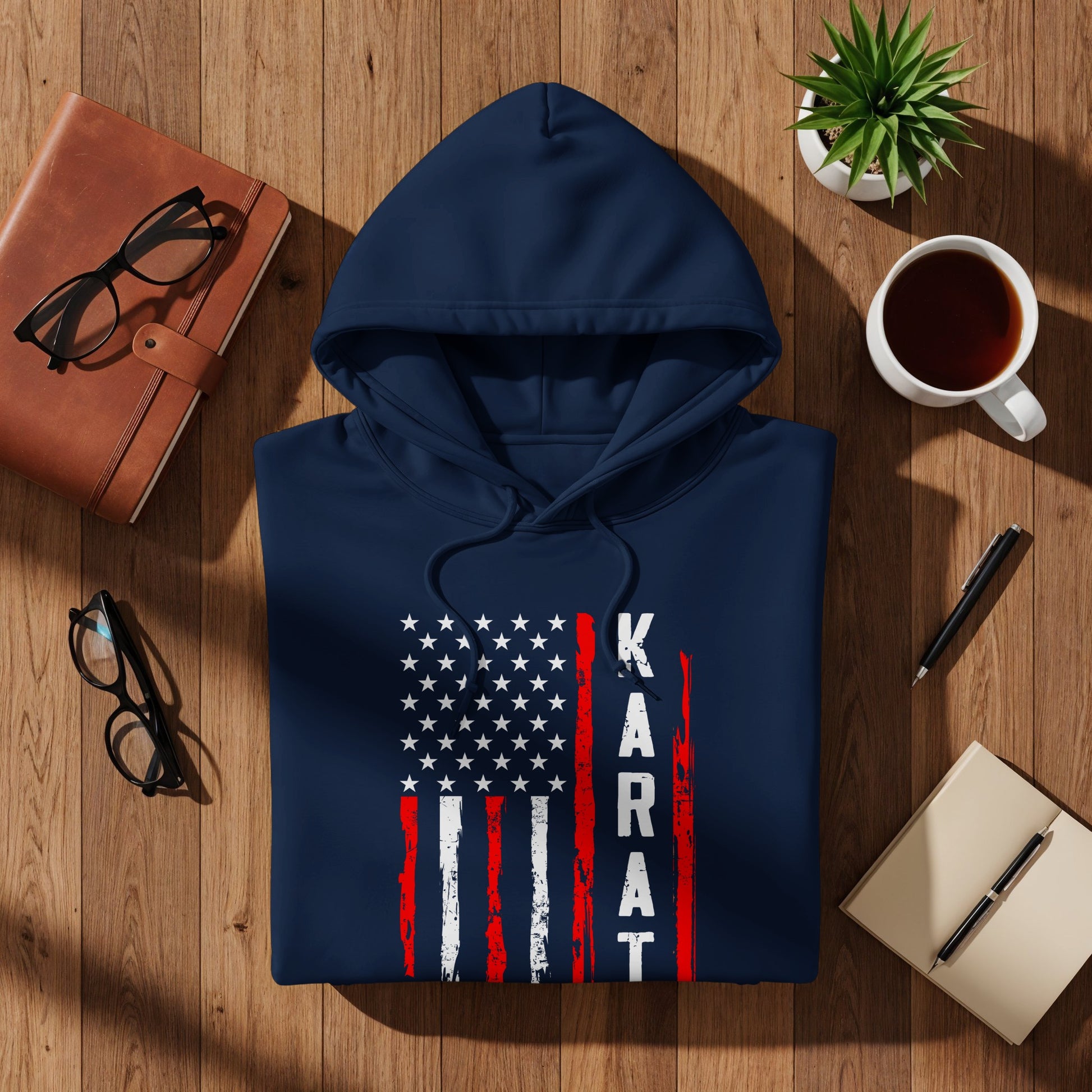 Navy blue hooded sweatshirt with distressed US flag design and "KARAT" text.