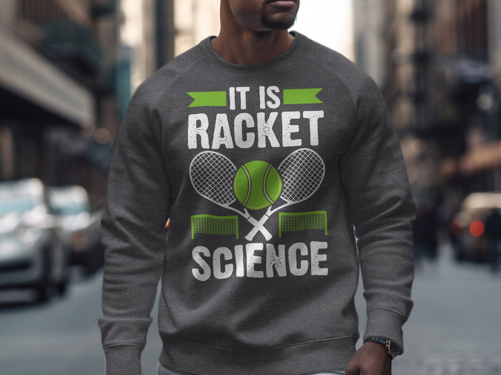 Gray sweatshirt with "RACKET SCIENCE" text and tennis rackets.