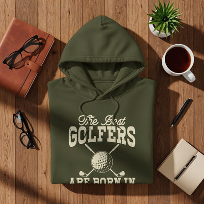 Olive green hoodie with "The Best Golfers Are Born In" and golf club graphic.