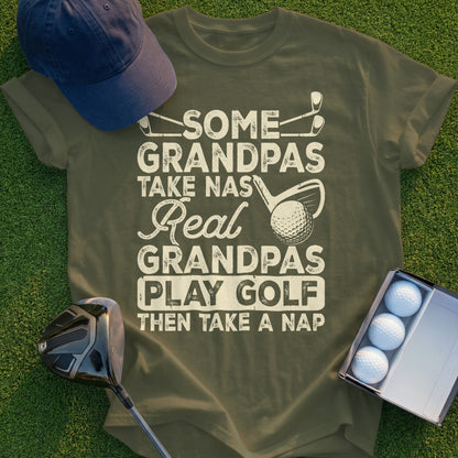 Olive green t-shirt with text "Some Grandpas Take Naps, Real Grandpas Play Golf Then Take a Nap."