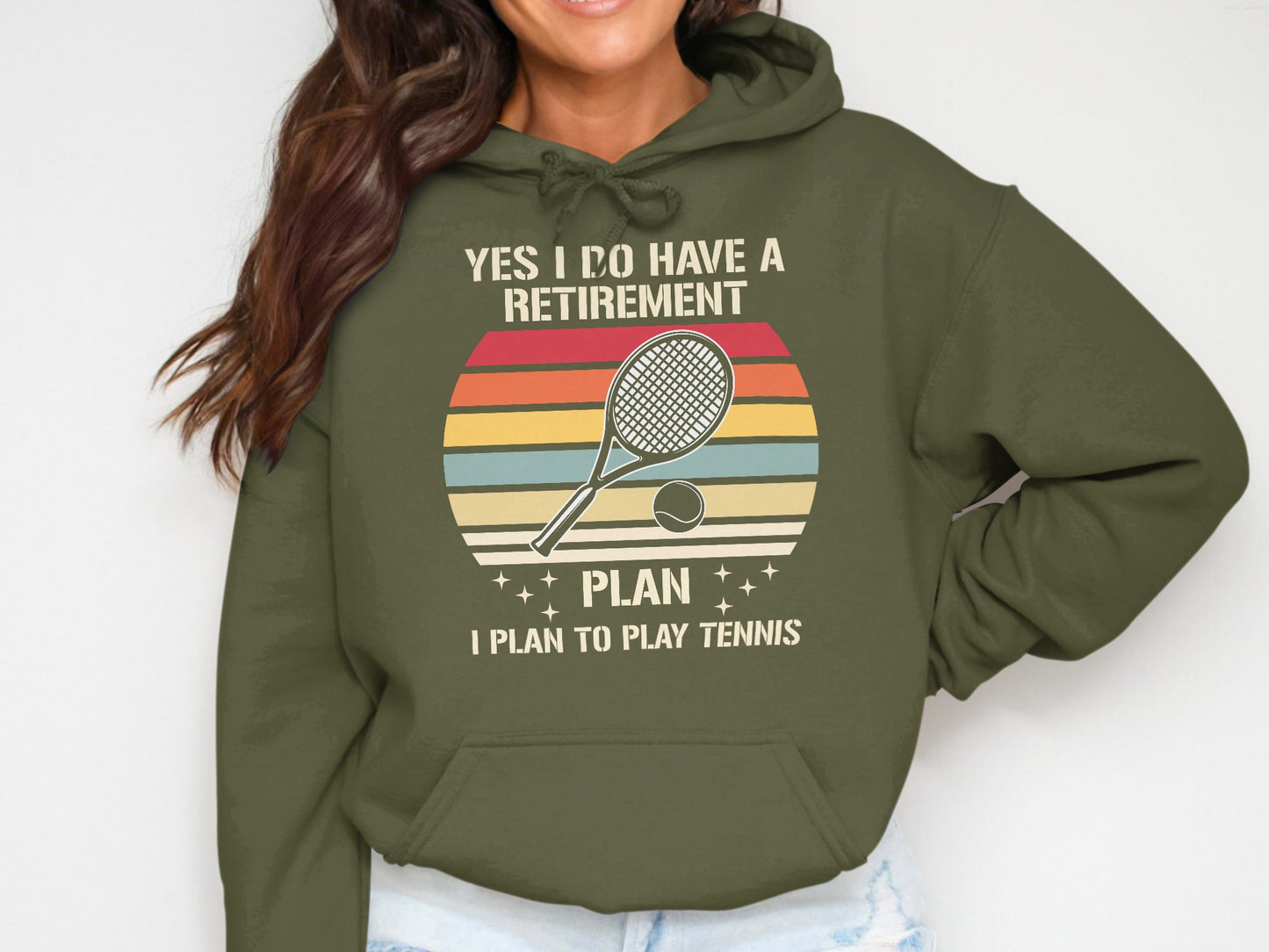 Green hoodie with text "YES I DO HAVE A RETIREMENT PLAN I PLAN TO PLAY TENNIS".