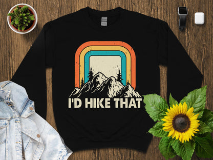 Black sweatshirt with vintage mountain sunset graphic and text "I'd Hike That".